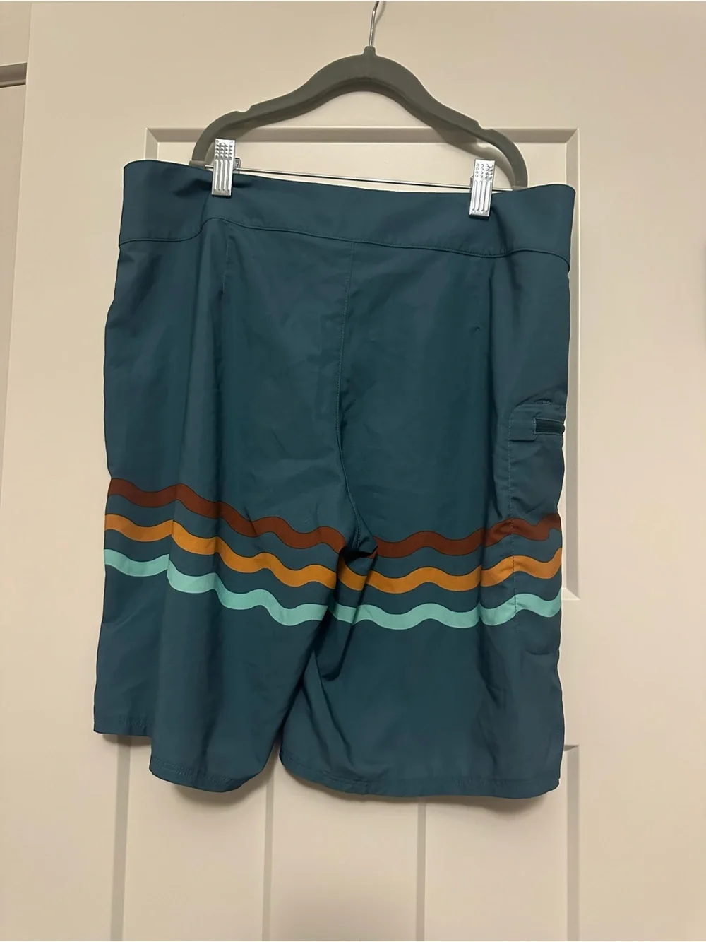 Patagonia Teal Board Shorts with Multicolor Wave Stripes